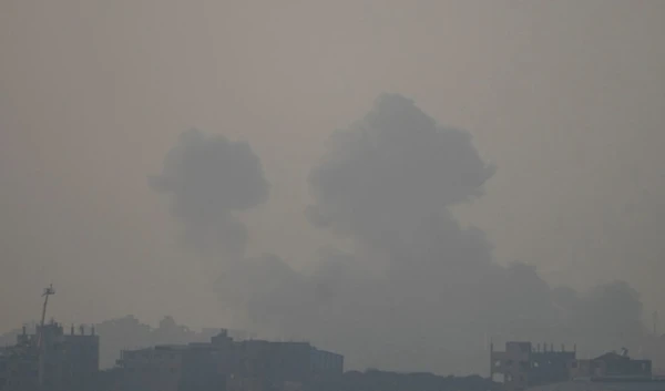 Smoke rises following an Israeli airstrike in the Gaza Strip, as seen from southern occupied Palestine, Thursday, Jan. 16, 2025 (AP)