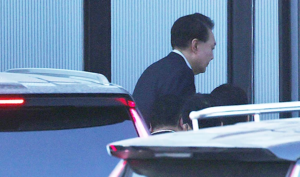 mpeached South Korean President Yoon Suk Yeol arrives at the Corruption Investigation Office for High-ranking Officials in Gwacheon, South Korea, on January 15, 2025. (Korea Pool via AP)