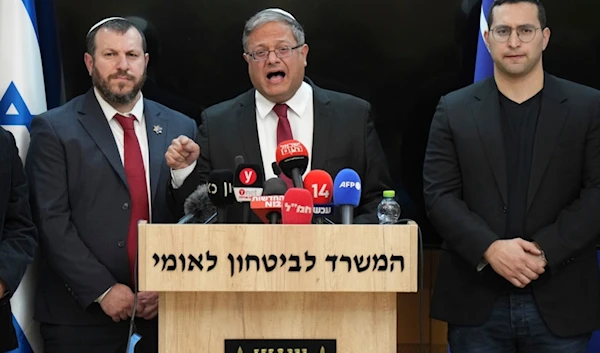 Israeli far-right Police Minister Itamar Ben-Gvir, center, in a statement to the media at his office in occupied al-Quds, occupied Palestine, on Thursday, January 16, 2025 (AP)