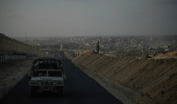 Israeli soldiers move on the Philadelphi Corridor along the border with Egypt, in the Gaza Strip on September 13, 2024. (AP)