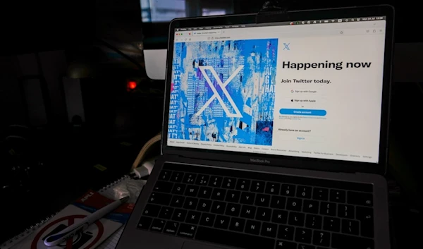 FILE - A view of a laptop shows the Twitter sign-in page with their logo, in Belgrade, Serbia, Monday, July 24, 2023. (AP Photo/Darko Vojinovic, File)