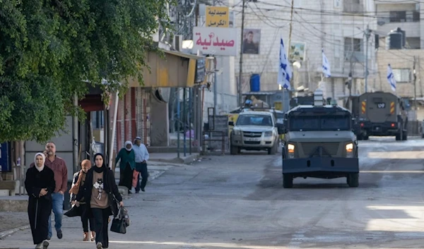 Israeli occupation forces vehicles are seen during a military operation in the West Bank city of Jenin, occupied Palestine, Tuesday, January 21, 2025 (AP)