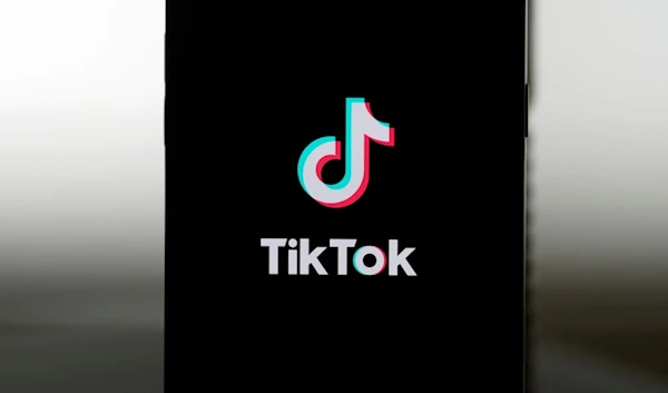 A TikTok logo is shown on a phone in San Francisco, Friday, Jan. 17, 2025. (AP Photo/Jeff Chiu)