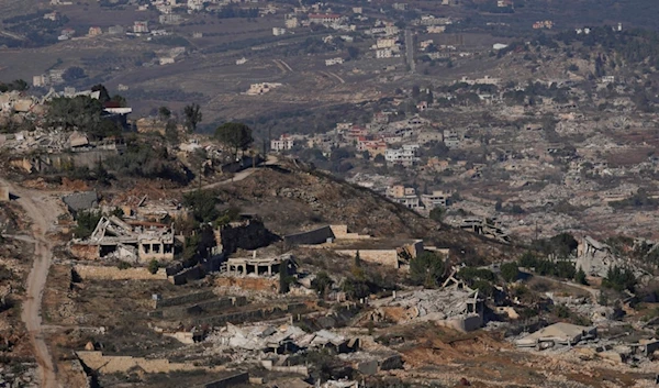 Destroyed buildings in an area of the village of Odaisseh in southern Lebanon, located next to the Palestinian-Lebanese border area, as seen from northern Israel, Dec. 5, 2024 (AP)