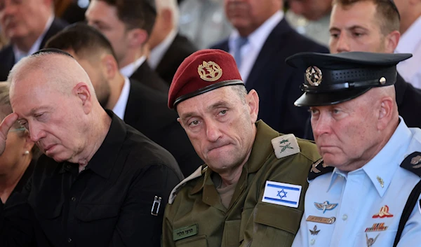 Israeli Chief of the General Staff Lieutenant-General Herzi Halevi (center) and then-Security Minister Yoav Gallant (left) attend a ceremony marking the Hebrew calendar anniversary of Al-Aqsa Flood, on Oct 27, 2024. (AFP0