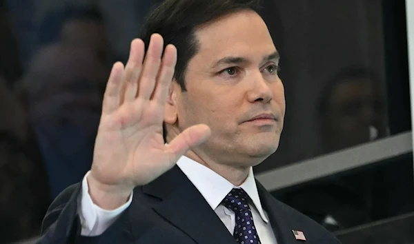 US Secretary of State Marco Rubio waves to employees upon arriving at the State Department in Washington, on January 21, 2025. (AFP)