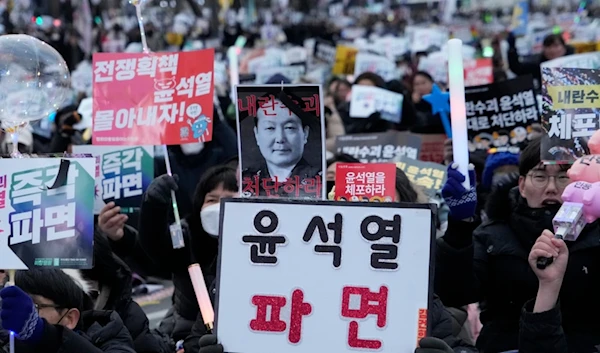 Protesters attend a rally demanding the arrest of impeached South Korean President Yoon Suk Yeol in Seoul, South Korea, Saturday, January 4, 2025 (AP)