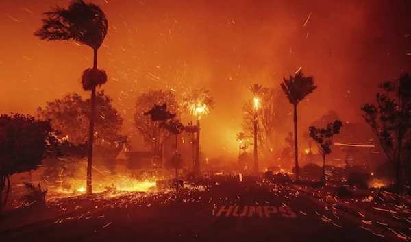 Wildfire forces 30,000 to evacuate as blaze engulfs Los Angeles