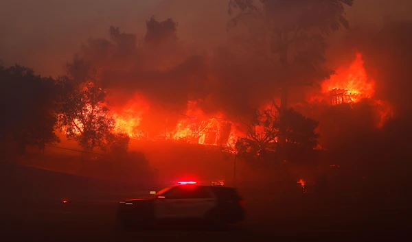 Los Angeles wildfires spread to Hollywood as 100,000 evacuate